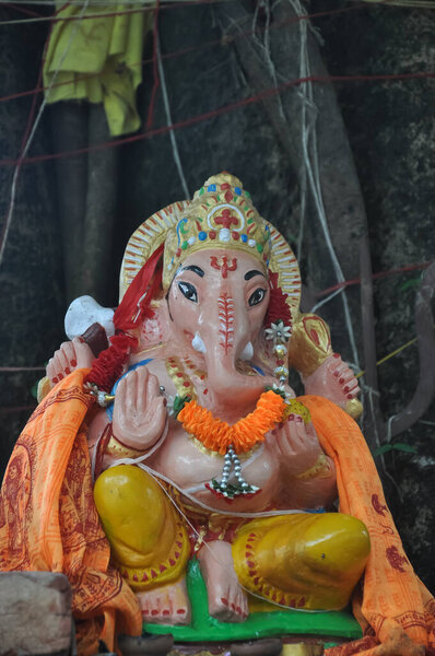 Closeup of sculpture of Lord Ganesha in temple 