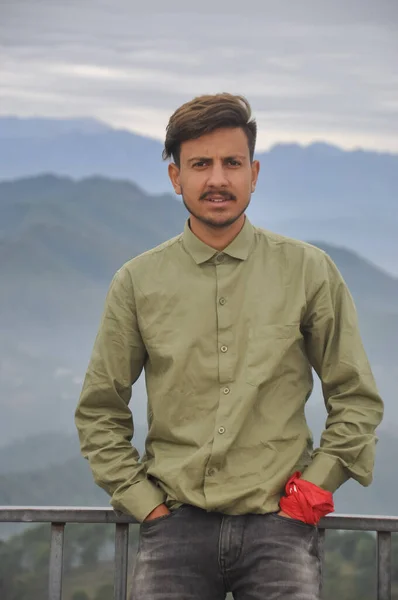 Charming Indian Young Guy Looking Camera Hands Pocket While Standing — Stok fotoğraf