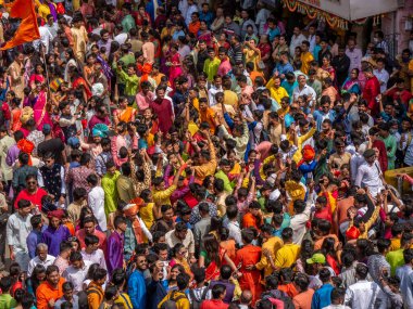 Mumbai, India - April 02, 2022 : Hindu new year parade celebration by maharashtrian people by dancing and wearing traditional dress.