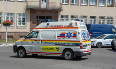 Nova Bana, Slovakia - July, 24, 2022 : Ambulance escort car at road bicycle race. International rescue system car.