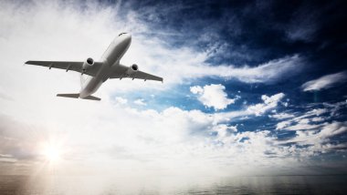 Ticari uçak gökyüzünde yükseliyor. 3B illüstrasyon.