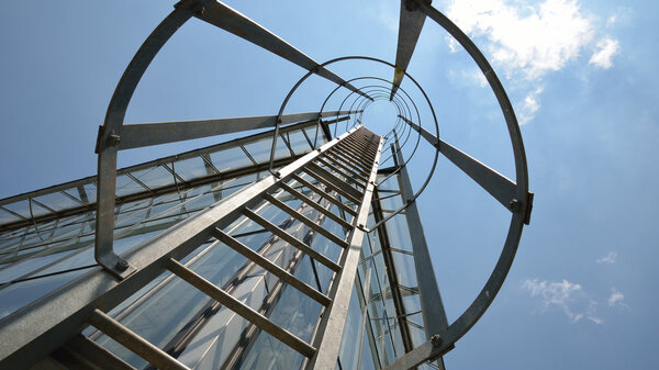 Fire escape ladder on a building office, iron staircase, abstrac
