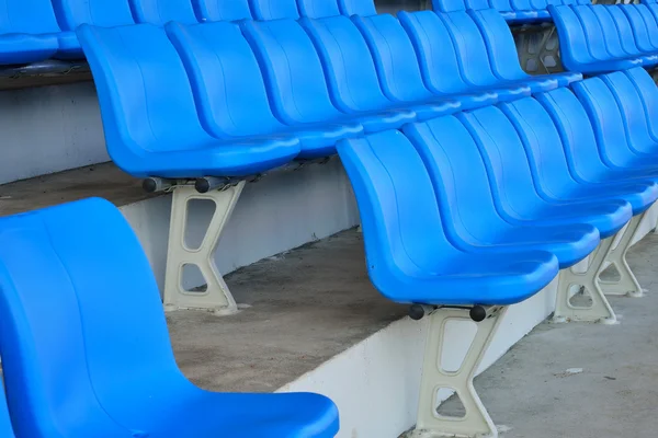 Empty bright blue stadium seats — Stock Photo, Image