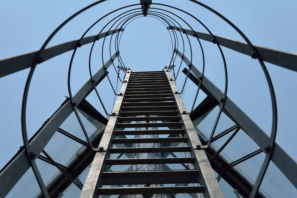 Fire escape ladder on a building office, iron staircase
