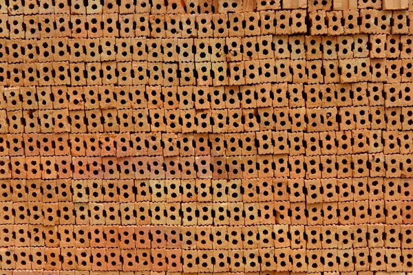 Στοίβα από κόκκινα τούβλα, τούβλα που χρησιμοποιούνται για την κατασκευή κτιρίων — Φωτογραφία Αρχείου