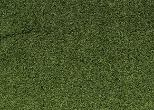 Umělá zelená tráva pozadí textura — Stock fotografie