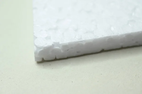 Fehér Tárgy Asztalon Csomagolóanyag — Stock Fotó