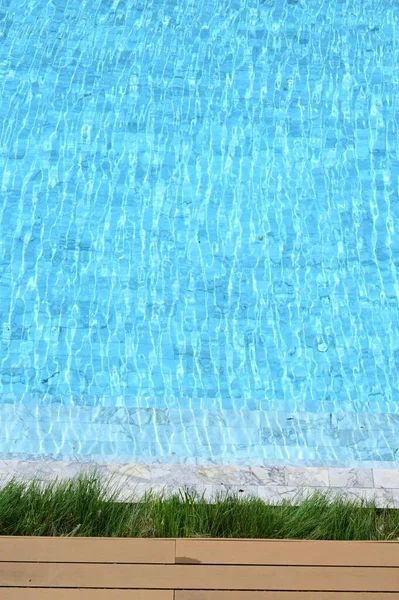 swimming pool in hotel, blue texture background