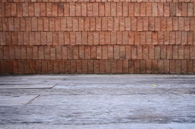 brown brick wall with cement floor, construction industry