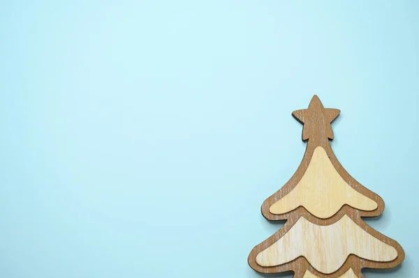 Árbol Navidad Madera Sobre Fondo Azul —  Fotos de Stock