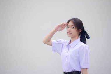 Asya Taylandlı lise öğrencisi üniforması. Güzel kız selamı.