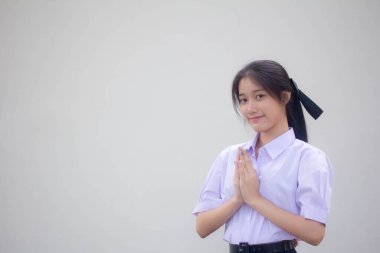 Tayland lisesi üniformalı güzel kız. Saygılı ol.