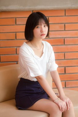 asia thai teen short hair White t-shirt beautiful girl smile and relax
