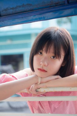 Asya Taylandlı genç pembe tişört Güzel kız