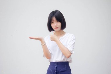 Asia Thai Teen White tişörtü Güzel kız elini göster
