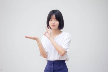 Asia Thai Teen White tişörtü Güzel kız elini göster