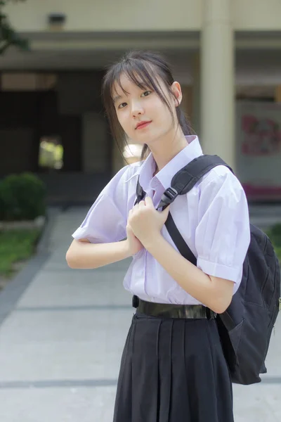 asia thai high school student uniform beautiful girl smile and relax