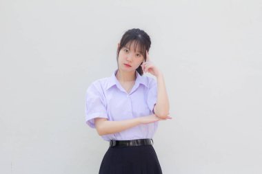 Asya Taylandlı lise öğrencisi üniforması. Güzel bir kız.