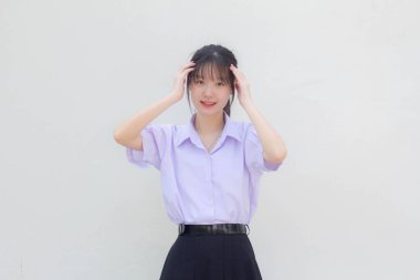 Asya Taylandlı lise öğrencisi üniforması. Güzel bir kız.