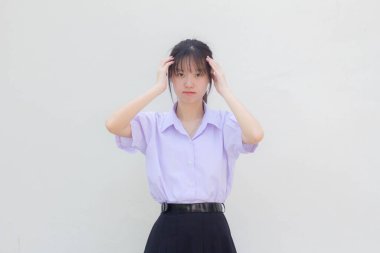 Asya Taylandlı lise öğrencisi üniforması. Güzel bir kız.