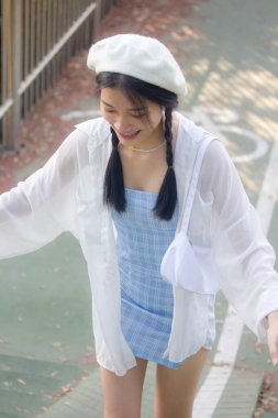 Asia thai teen blue dress güzel kız gülümse ve rahatla