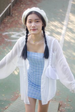 Asia thai teen blue dress güzel kız gülümse ve rahatla