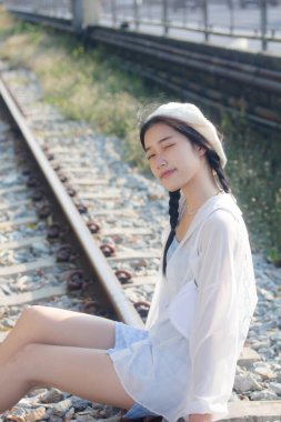 Asia thai teen blue dress güzel kız gülümse ve rahatla