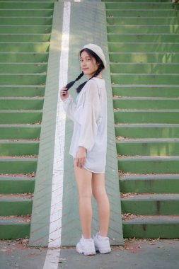 Asia thai teen blue dress güzel kız gülümse ve rahatla