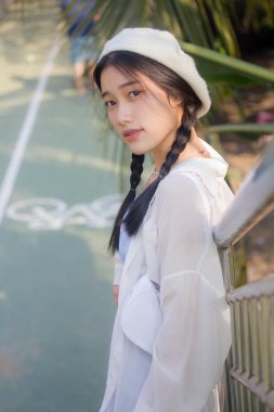 Asia thai teen blue dress güzel kız gülümse ve rahatla