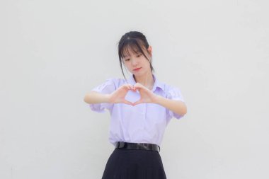 asia thai high school student uniform beautiful girl give heart