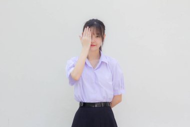 Asya Thai Lisesi öğrencisi üniforması güzel kız gözleri kapalı
