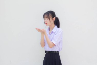 Asya Taylandlı lise öğrencisi üniforması. Güzel kız. Öptüm.