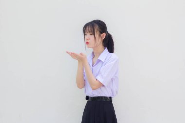 Asya Taylandlı lise öğrencisi üniforması. Güzel kız. Öptüm.