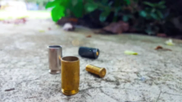 Blur Empty Pistol Bullet Shells Concrete Ground Shooting Range — Stock Photo, Image