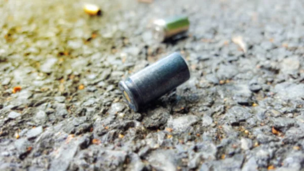 Blur Empty Pistol Bullet Shells Concrete Ground Shooting Crime Scene — Stock Photo, Image