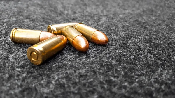Golden Shiny Bullets Dark Gray Fabric Concept Security Social Personal — Stock Photo, Image