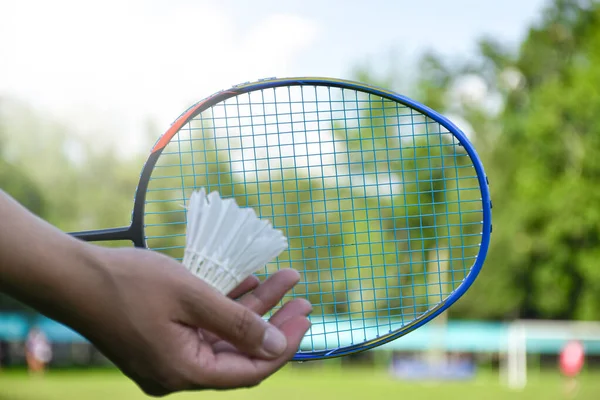 Shuttlecock Racket Going Hit Shuttlecock Which Holding Hand Front Racket — Stock Photo, Image