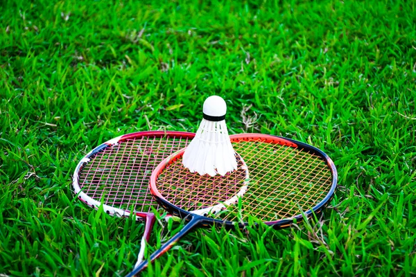 Shuttlecocks Badminton Rackets Green Field — Stock Photo, Image