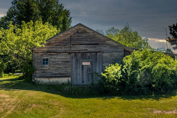 Rustic farm buildings in the ghost town of  Wimborne Alberta Canada