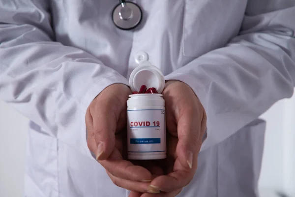 Hospital Doctor Hands Hold White Bottle Covid Antiviral Pills Background — Zdjęcie stockowe