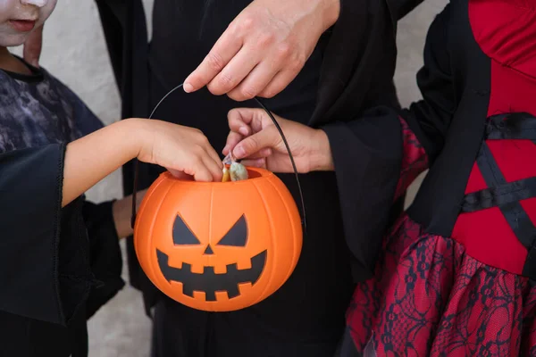 Happy Halloween Details Hands Woman Boy Girl Putting Candy Sweets — Stok fotoğraf