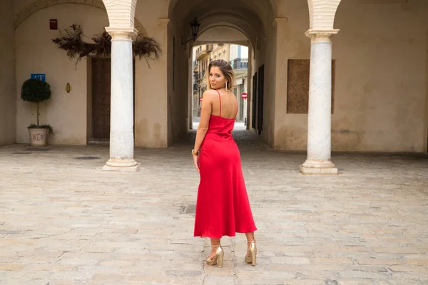 Young Blonde Beautiful Woman Red Dress Visiting Seville Woman Poses — Stok fotoğraf