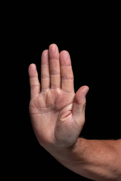 Ausgestreckte Rechte Handfläche Nach Vorne Auf Schwarzem Hintergrund — Stockfoto