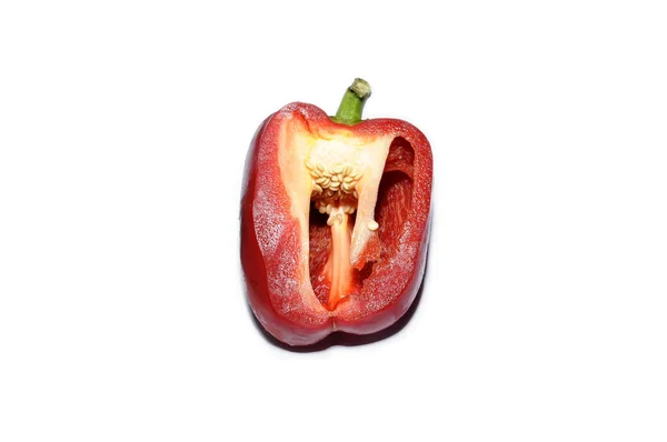 Red bell pepper cut on white — Stock Photo, Image