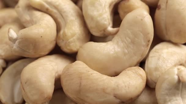 Close Raw Cashew Nuts Top View Rotation — ストック動画