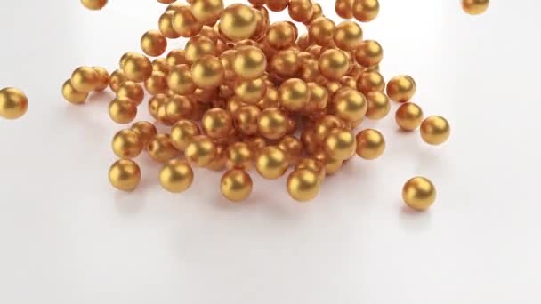 Zlaté Korálky Roztroušené Bílém Pozadí Zlaté Kuličky Padající Podlahu Pohybová — Stock video