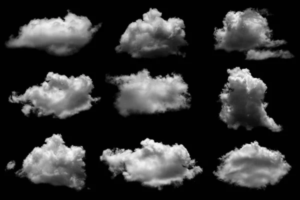 Collections of separate white clouds on a black background have real clouds. White cloud isolated on a black background realistic cloud. white fluffy cumulus cloud isolated cutout on black background.