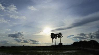 Time Lapse of the Sunset with Colorful dramatic sky in the countryside