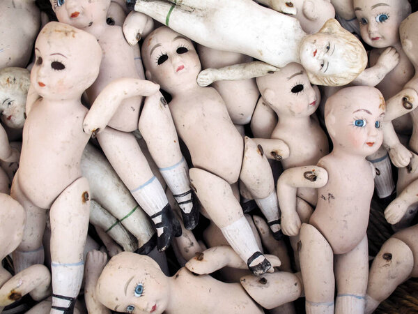 a lot of clay dolls on a white background