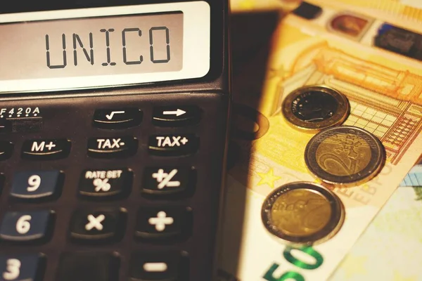 Calculator Met Het Teken Unico Concept Van Italiaanse Belastingberekening — Stockfoto